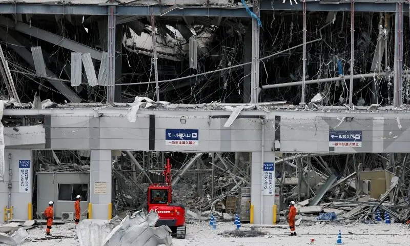 Rescuers in Japan haul survivors from collapsed mall as earthquake toll rises to 13