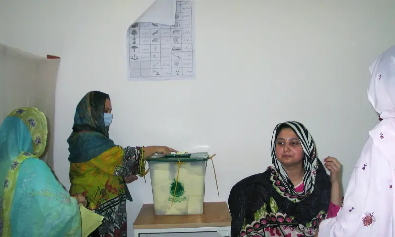 Voting Underway in AJK’s Third Election Phase Amid Tight Security, Rigging Claims Polling opened at 8am today in four constituencies of Azad Jammu and Kashmir’s Poonch Division, covering the Bagh and Haveli districts, as the third phase of the region’s staggered elections gets underway. Voting will run until 5pm. Heavy Security Deployment Authorities are bracing for potential unrest. The Election Commission has flagged most of the 803 polling stations across the four constituencies as sensitive or highly sensitive, and has moved in reinforcements to match. Election Commission Secretary Raja Mohammad Shakeel said more than 10,000 additional troops have been deployed alongside local police from both districts to keep order and give voters a secure environment to cast their ballots. Where Things Stand AJK’s elections are being held in stages, and tensions between demonstrators and officials have shadowed the process throughout. The first two phases — in Mirpur and Muzaffarabad divisions — took place on July 27 and August 2. The PML-N has come out ahead so far with 24 seats, while the PPP trails with 10. Today’s round was originally supposed to cover all 11 constituencies of Poonch Division, but the Election Commission scaled it back last week to just Bagh and Haveli, citing law-and-order concerns. The remaining seven constituencies — five in Poonch district and two in Sudhnoti — may go to the polls around August 20 or 21. Rigging Allegations Fly Again As in earlier phases, the PPP and PML-N — rivals in AJK despite being coalition partners at the federal level — have traded accusations. The PPP has posted a string of complaints on X alleging misconduct in Bagh and Haveli, including: Roads blocked near Banni Marasira, allegedly to stop voters and monitors from reaching polling stations where PML-N supporters were accused of illegally stamping ballots Delayed voting at several stations due to late-arriving staff PPP polling agents forcibly removed from multiple stations, allegedly allowing unsupervised ballot stamping Agents blocked from stations in Kahuta City by PML-N workers The Election Commission confirmed it had received complaints against two presiding officers accused of manipulating results and said both had been pulled from election duty. Key Races to Watch Roughly 460,000 voters are registered across the four constituencies, choosing among 82 candidates for 803 polling stations. Three heavyweight names are on the ballot: AJK Prime Minister Faisal Mumtaz Rathore (PPP) is defending his seat in LA-17 against PML-N’s Mohsin Aziz and independent Khawaja Tariq Saeed — a former ally turned rival after a falling-out over a seat-sharing agreement. Former PM Sardar Tanveer Ilyas is contesting LA-15 after briefly threatening to boycott the phase. He faces PML-N’s Mushtaq Ahmed Minhas, PPP’s Sardar Ziaul Qamar, and Jamaat-i-Islami’s Dr Mohammad Khan. Former PM Sardar Attique Ahmed Khan, longtime leader of the Muslim Conference, faces a serious challenge in LA-14 from Sajid Iqbal Abbasi, a self-funded philanthropist-turned-candidate from the same tribe as Attique. In LA-16, former ministers Sardar Mir Akbar (PML-N) and Sardar Qamar Zaman (PPP) are the main contenders. Results from this phase are expected to shape the balance of power as PML-N looks to consolidate its lead heading into the final rounds of voting.
